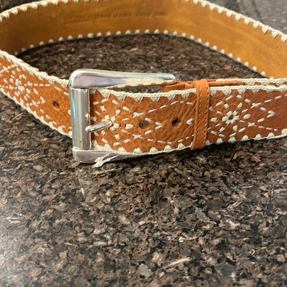 Michael Kor’s  wide belt.